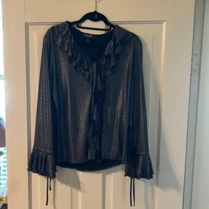 A.Z.I shimmery black dressy blouse. Ruffle collar ruffle sleeves with ties.